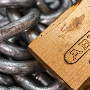 Close up of padlock with chains in the background - Link to Locking Devices & Reproduction of Keys